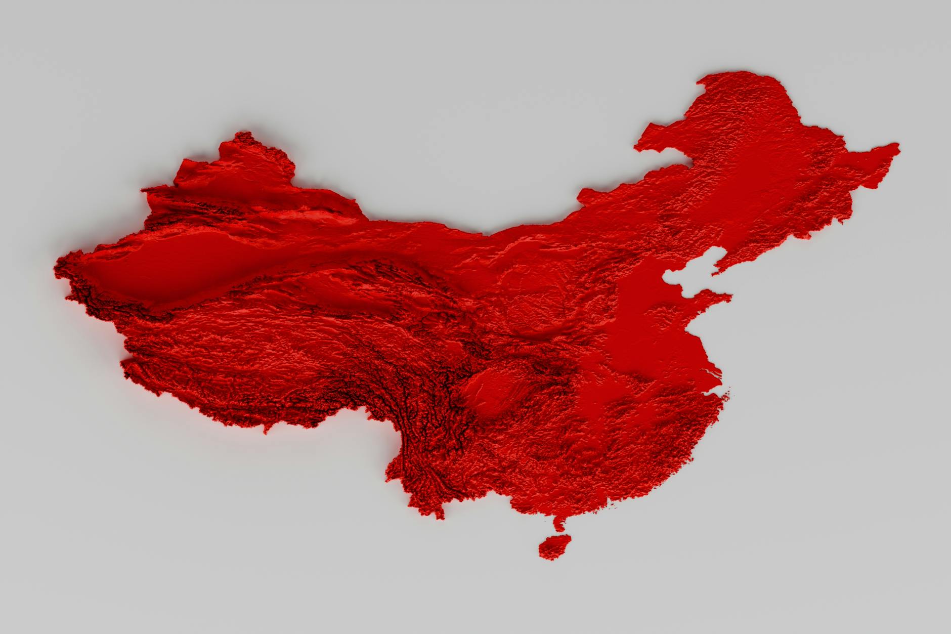 A vibrant 3D relief of China in red, showcasing intricate textures and topographical details.