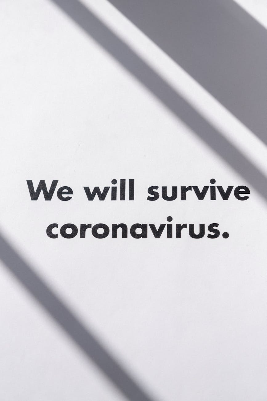 Shadowed text saying 'We will survive coronavirus' symbolizing hope and resilience.